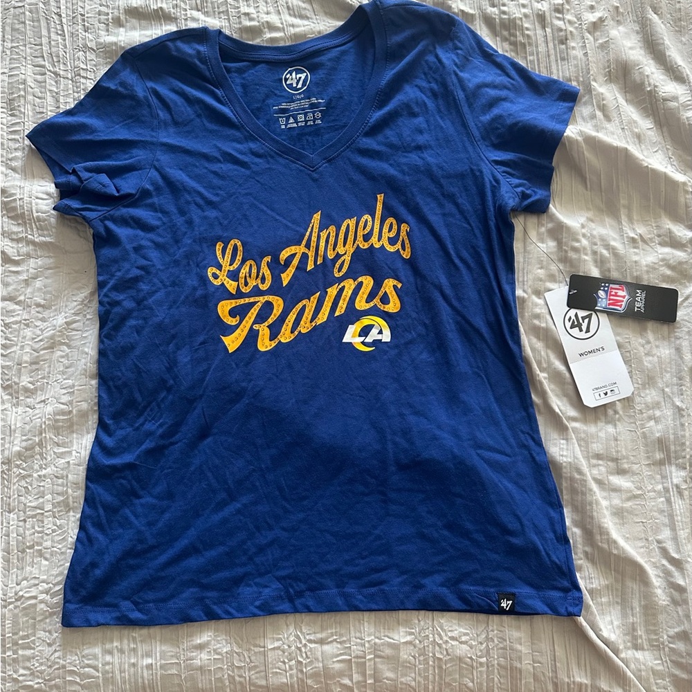 Woman’s LA rams shirt.